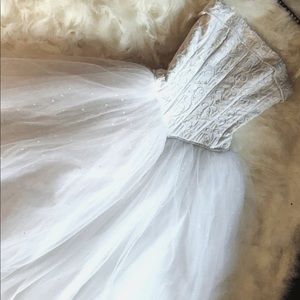 Tulle wedding dress with corseted satin bodice